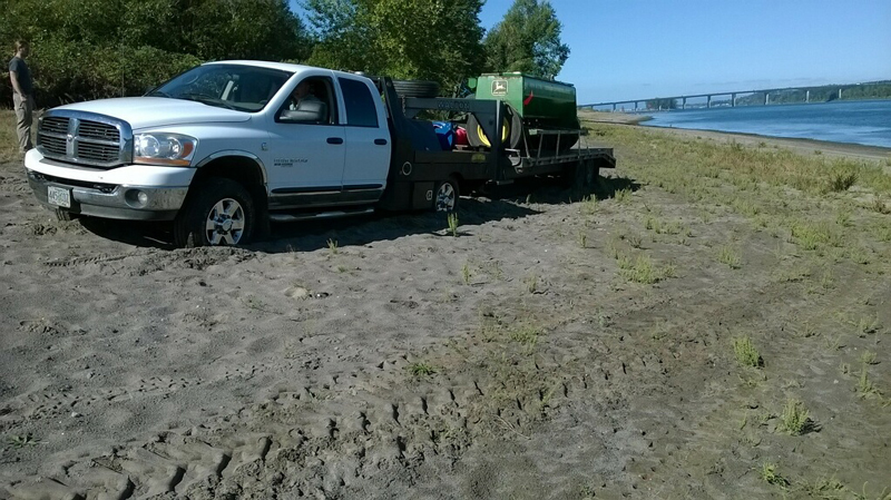 It was heavy work to haul 1,000 lbs of equipment across the beach.