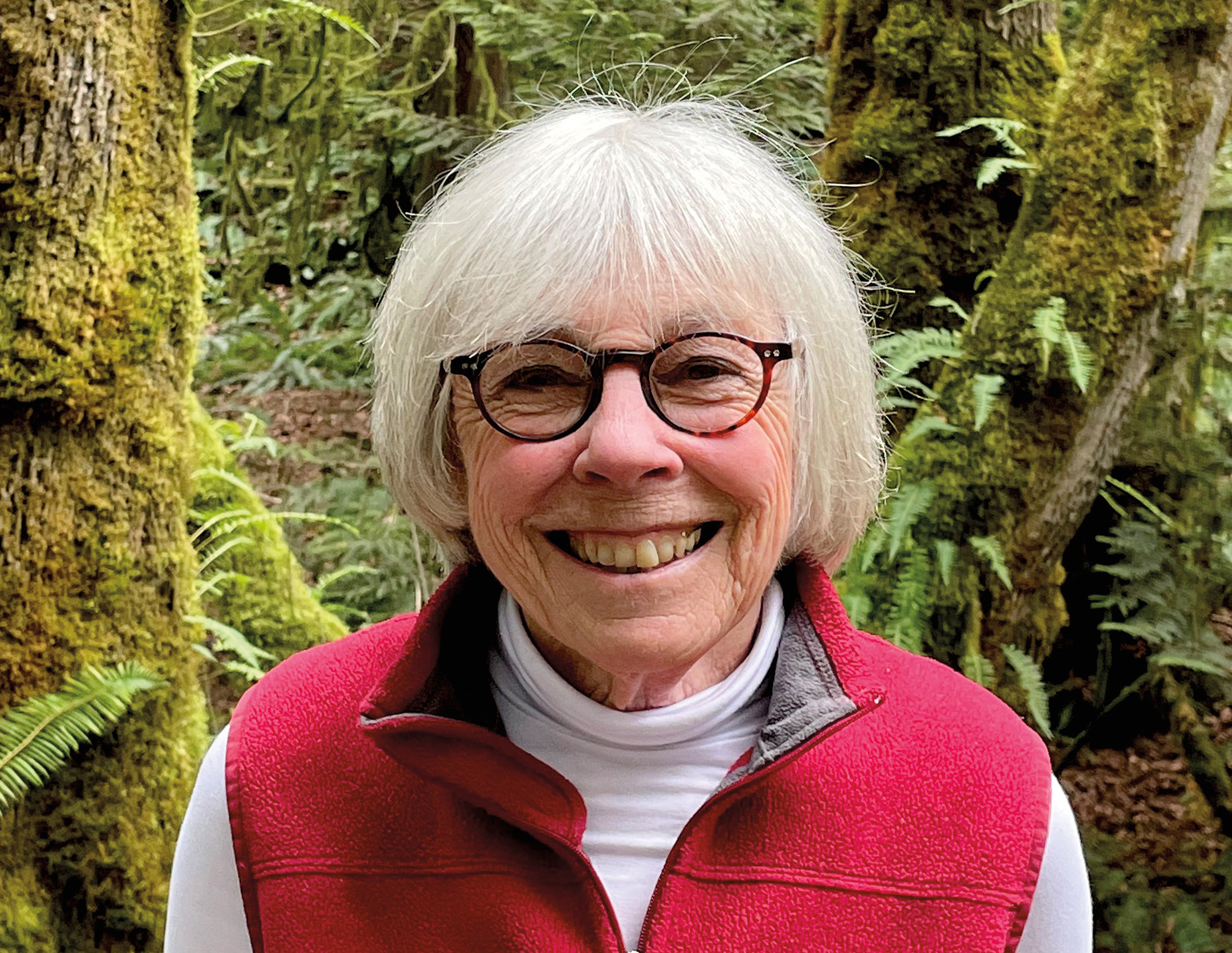 Melody Mackey Allen, Xerces Society executive director, 1984 to 2000. She has short grey hair, black-rimmed glasses, and a broad smile.