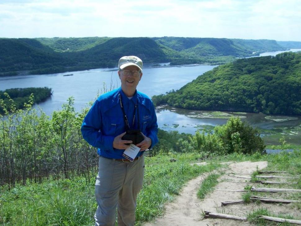 Don Leaon stands before a view of the Mississippi River Valley in southeastern Minnesota.